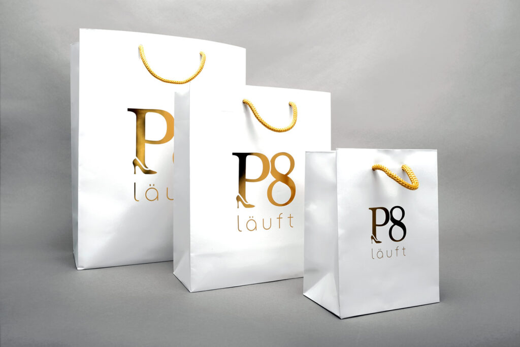 P8_Taschen_3er P8 läuft, Taschen, drei Hochformate, Heißfolienprägung Gold